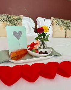 En eller flere senge i et værelse på Plaza Lago di Garda