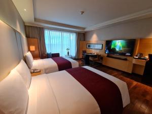 TV a/nebo společenská místnost v ubytování JW Marriott Hotel Chandigarh