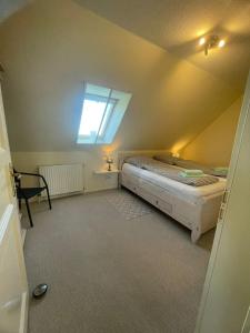 Postel nebo postele na pokoji v ubytování Ferienwohnung Noorblick