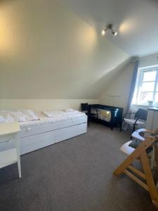 Postel nebo postele na pokoji v ubytování Ferienwohnung Noorblick + 30 fotografií