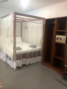 Postel nebo postele na pokoji v ubytování Hotel Paradiso,