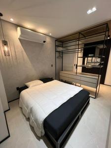 Katil atau katil-katil dalam bilik di Hub Home - Vista Incrível