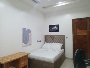 Ένα ή περισσότερα κρεβάτια σε δωμάτιο στο Luxe Stays