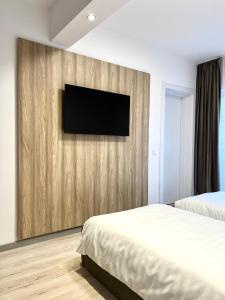 TV a/nebo společenská místnost v ubytování Riverside ApartHotel by InnTime
