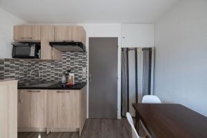 Køkken eller tekøkken på Le Septimontain A28