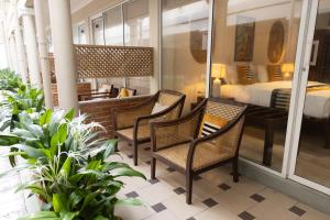 A seating area at Neevana Hotel Hikkaduwa