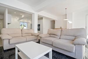 Posedenie v ubytovaní Hauzify I Apartament Riera