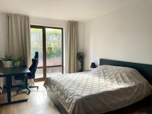 Postel nebo postele na pokoji v ubytování Ground floor 2-bedrooms, 2-bathrooms apartment near Bansko in a complex with pools and SPA included