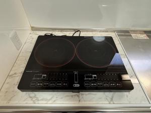 a dj equipment sitting on top of a counter at Rak in Osaka