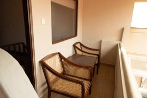 A seating area at Neevana Hotel Hikkaduwa