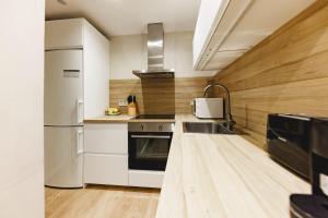Una cocina o zona de cocina en Bravissimo Apartaments Mora 4