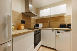 Una cocina o zona de cocina en Bravissimo Apartaments Mora 4