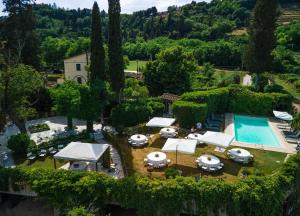 an aerial view of a villa with a swimming pool at Timeless Elegance in Poggibonsi