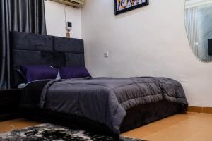 Cama o camas de una habitación en 2 Bedroom Luxury Apartment with Pool -24Hrs Power -PS4