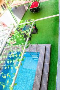 - Vistas a un parque infantil con piscina en 2 Bedroom Luxury Apartment with Pool -24Hrs Power -PS4, en Lagos 19 fotos más