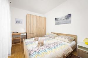 Postel nebo postele na pokoji v ubytování Apartment Tania