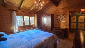 Ένα ή περισσότερα κρεβάτια σε δωμάτιο στο BBkey Chalet alle Terme