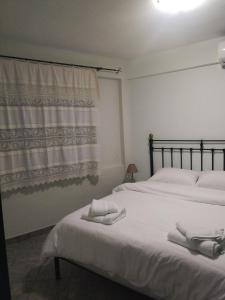 Posteľ alebo postele v izbe v ubytovaní Pelionature Home