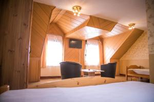 Postel nebo postele na pokoji v ubytování Hotel Am Rathaus