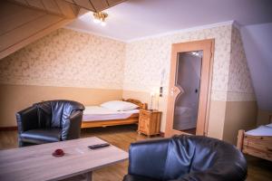 Postel nebo postele na pokoji v ubytování Hotel Am Rathaus