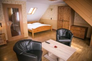 Postel nebo postele na pokoji v ubytování Hotel Am Rathaus