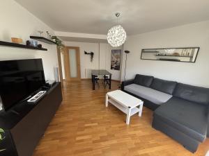 TV a/nebo společenská místnost v ubytování Grupo Gontad Apto Heol - Cabana de Bergantiños