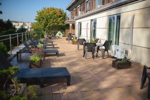 Vonkajšia záhrada v ubytovaní Hotel Kuracyjny Spa & Wellness