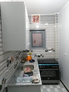 Kuchyň nebo kuchyňský kout v ubytování Lutos Flower Apartment