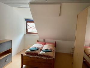 Posteľ alebo postele v izbe v ubytovaní Ferienwohnung Sophie