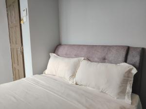 G9 Hotel Alor Setar客房内的一张或多张床位