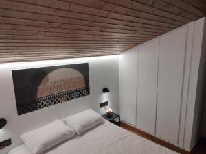 Giường trong phòng chung tại Sierra Nevada El Tesoro