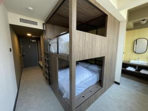 Postel nebo postele na pokoji v ubytování JOST Hôtel Lille Centre