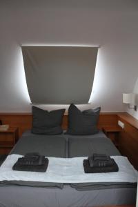Postel nebo postele na pokoji v ubytování Burghotel - Das Original