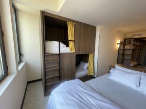 Postel nebo postele na pokoji v ubytování JOST Hôtel Lille Centre