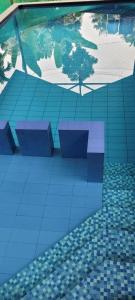 Bazén v ubytování Kuttickattil Pool Home Stay Kumarakom nebo v jeho okolí