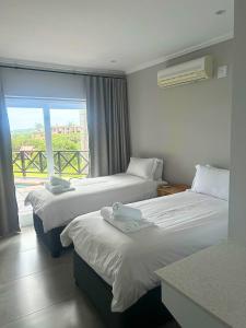 Postel nebo postele na pokoji v ubytování San Lameer Villa 14108 - 4 Bedroom Superior - 8 pax - San Lameer Rental Agency + 46 fotografií