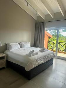 Postel nebo postele na pokoji v ubytování San Lameer Villa 14108 - 4 Bedroom Superior - 8 pax - San Lameer Rental Agency