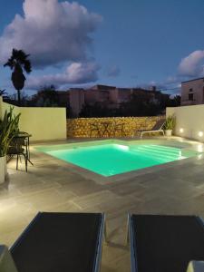 Bazén v ubytování Thistle Lodge Peaceful Gozo Retreat with Pool Ambience nebo v jeho okolí