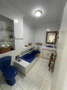 Et opholdsområde på Umdloti Cottage on 5th Avenue