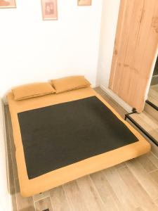 Posteľ alebo postele v izbe v ubytovaní Le studio du Coutach