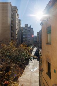an empty street in a city with buildings at Bravissimo Maragall, very spacious and central in Girona