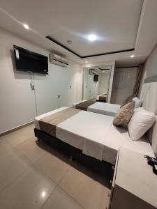 Postel nebo postele na pokoji v ubytování Hotel Med 33