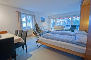 Postel nebo postele na pokoji v ubytování Haus Matten, Apartment Birch