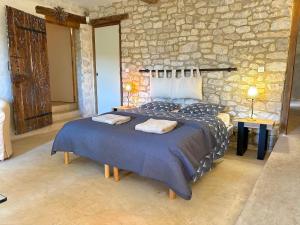 Ένα ή περισσότερα κρεβάτια σε δωμάτιο στο Domaine Coeur des Vignes +74 φωτογραφίες