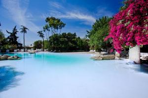 Bazén v ubytování Arbatax Park Resort - Telis nebo v jeho okolí