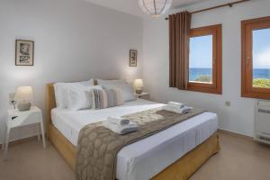 Postel nebo postele na pokoji v ubytování Ascuri Apartment