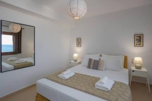 Postel nebo postele na pokoji v ubytování Ascuri Apartment