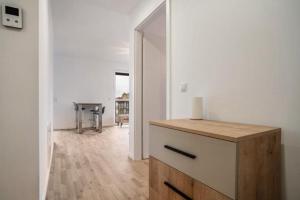 Η κουζίνα ή μικρή κουζίνα στο Modernes und wunderschönes Loft mit Terrasse und Stadtblick in Greifswald