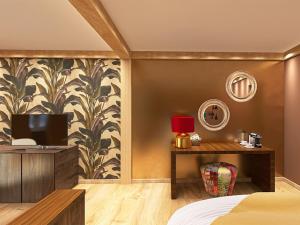 Posteľ alebo postele v izbe v ubytovaní Alpenhotel St.Christoph