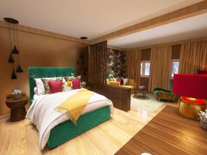 Posteľ alebo postele v izbe v ubytovaní Alpenhotel St.Christoph